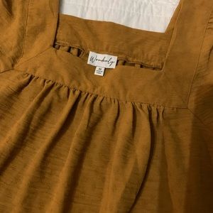 Silk rust long sleeve shirt. Size Medium. Name brand- Wonderly. Relaxed fit.